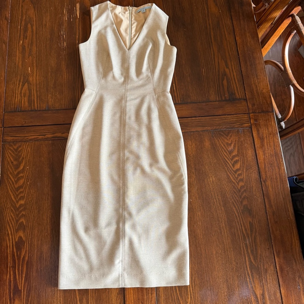 Like new Antonio Melanie size 0 mid length dress tan. Fully lined EUC